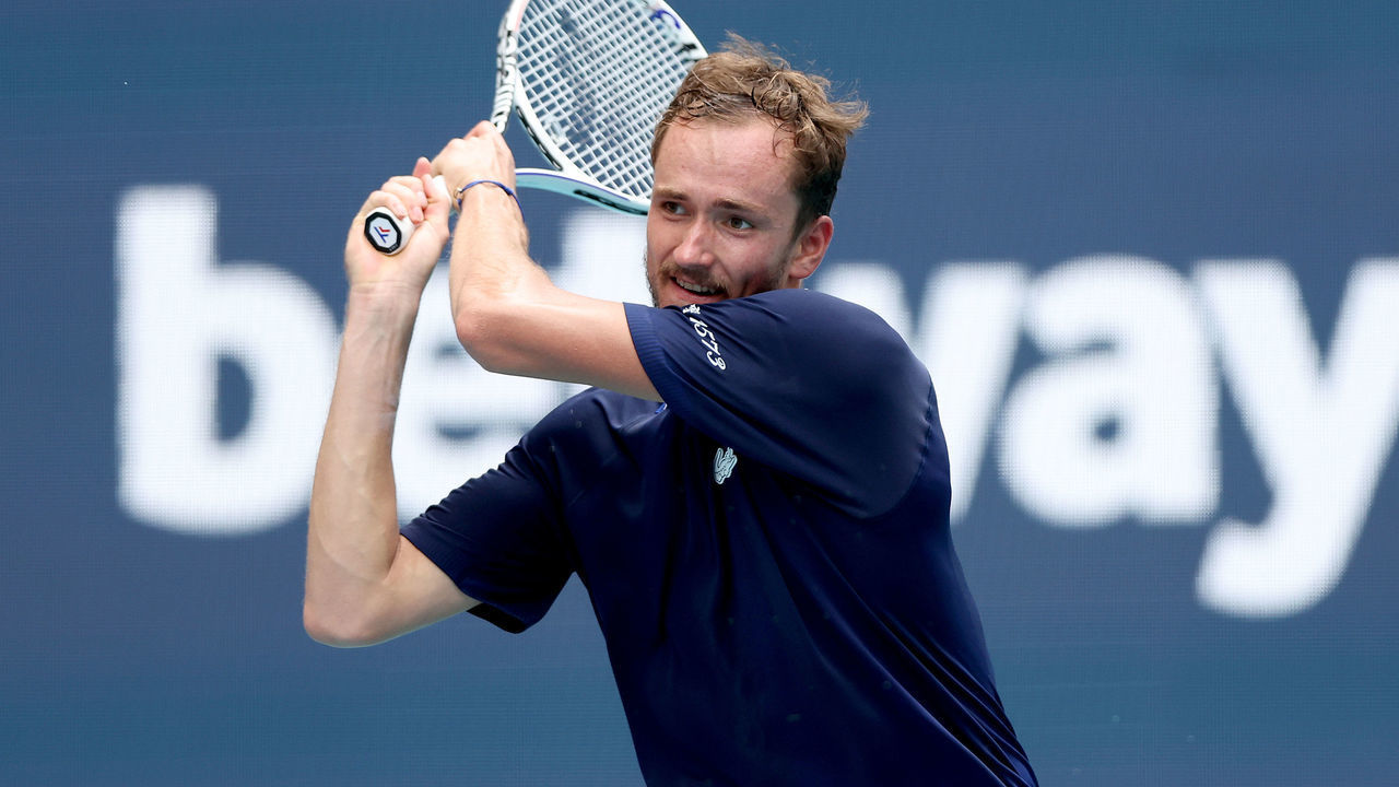 MIAMI GARDENS, FLORIDA - MARCH 31: Daniil Medvedev of Russia returns a shot to Hubert Hurkacz of Poland during the Miami Open at Hard Rock Stadium on March 31, 2022 in Miami Gardens, Florida.