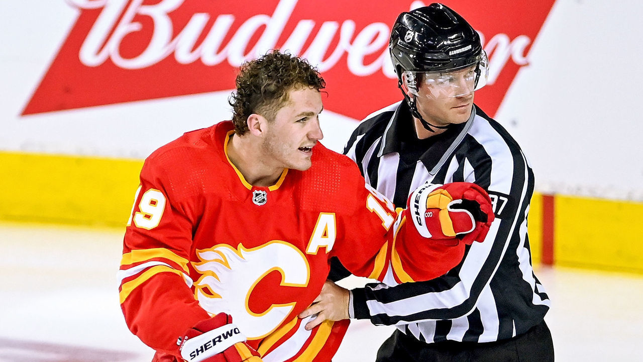 CALGARY, AB - MAY 05: Calgary Flames Right Wing Matthew Tkachuk (19) points to Dallas Stars Defenceman John Klingberg (3), not shown, after fighting during the first period of game 2 of the first round of the NHL Stanley Cup Playoffs between the Calgary Flames and the Dallas Stars on May 5, 2022, at the Scotiabank Saddledome in Calgary, AB.