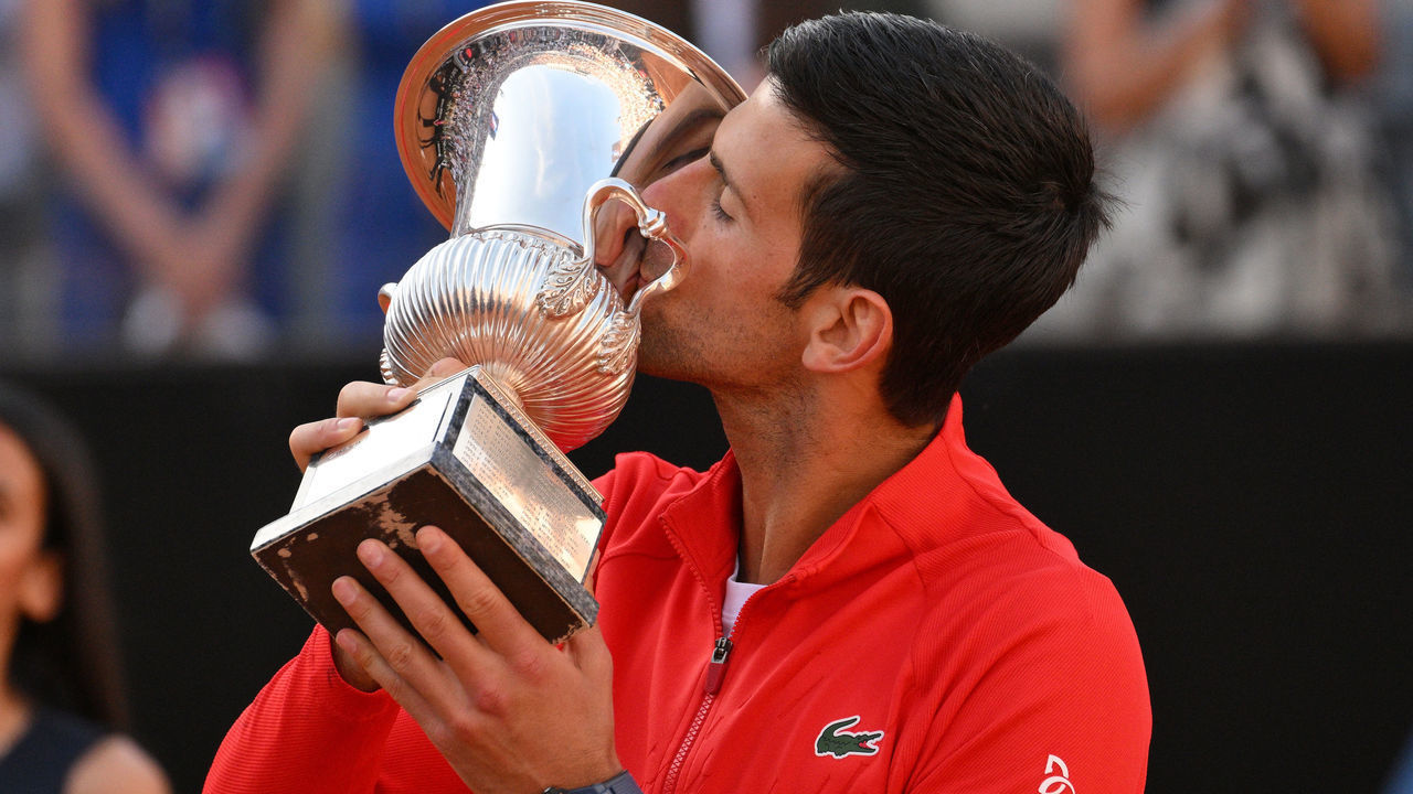 FORO ITALICO, ROME, ITALY - 2022/05/15: Novak Djokovic of Serbia celebrates with the trophy at the end of his final match against Stefanos Tsitsipas of Greece at the Internazionali BNL D'Italia tennis tournament. Djokovic won 6-0, 7-6 over Tsitsipas.
