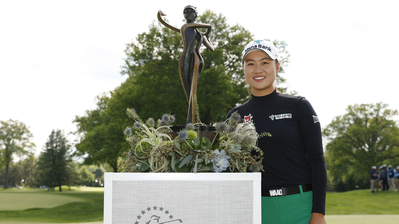CLIFTON, NEW JERSEY - MAY 15: Minjee Lee of Australia poses with the trophy after sinking a putt for birdie on the 18th green to win during the final round of the Cognizant Founders Cup at Upper Montclair Country Club on May 15, 2022 in Clifton, New Jersey.