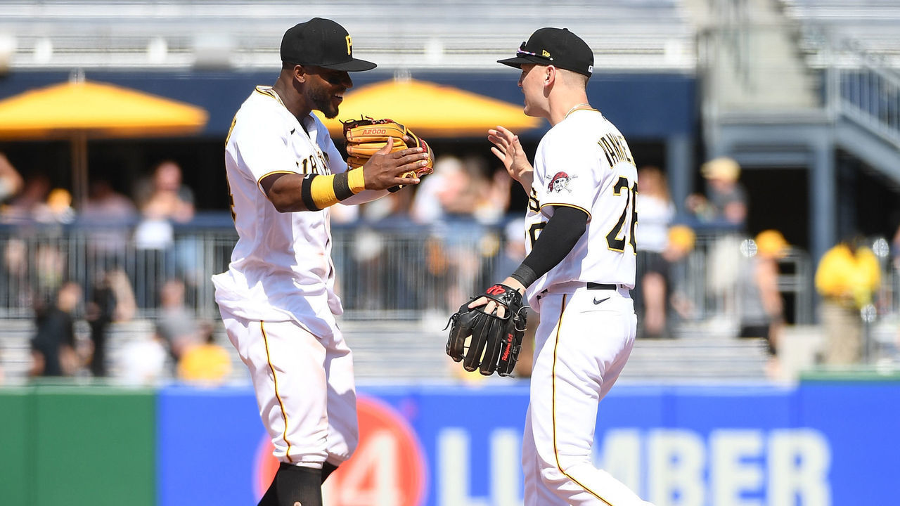 PITTSBURGH, PA - MAY 15: Rodolfo Castro #14 of the Pittsburgh Pirates celebrates with Josh VanMeter #26 after the final out in a 1-0 win over the Cincinnati Reds at PNC Park on May 15, 2022 in Pittsburgh, Pennsylvania. The Pirates won 1-0 despite being no hit by the Cincinnati Reds.