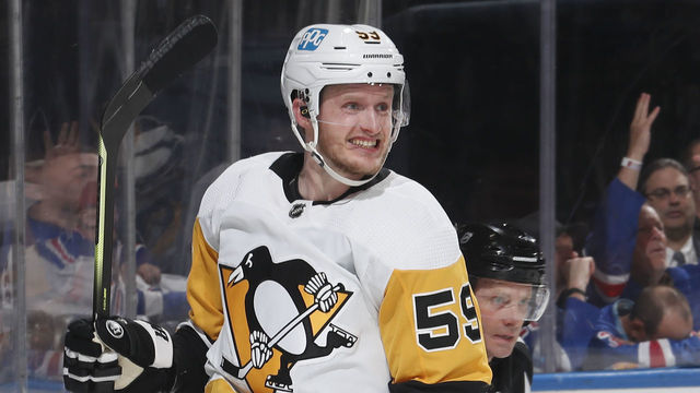 NEW YORK, NY - MAY 15: Jake Guentzel #59 of the Pittsburgh Penguins reacts after scoring a goal during the second period in Game Seven of the First Round of the 2022 Stanley Cup Playoffs against the New York Rangers at Madison Square Garden on May 15, 2022 in New York City.