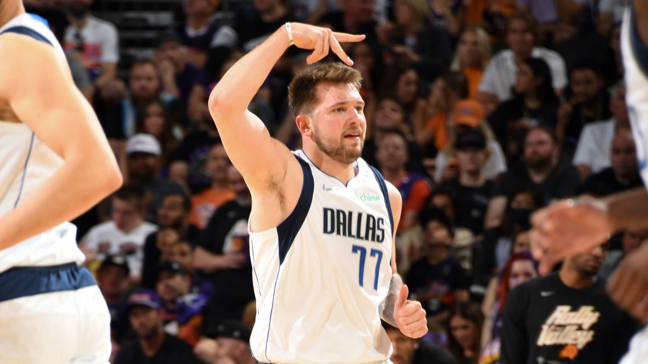 PHOENIX, AZ - MAY 15: Luka Doncic #77 of the Dallas Mavericks celebrates a three point basket against the Phoenix Suns during Game 7 of the 2022 NBA Playoffs Western Conference Semifinals on May 15, 2022 at Footprint Center in Phoenix, Arizona. Mandatory Copyright Notice: Copyright 2022 NBAE