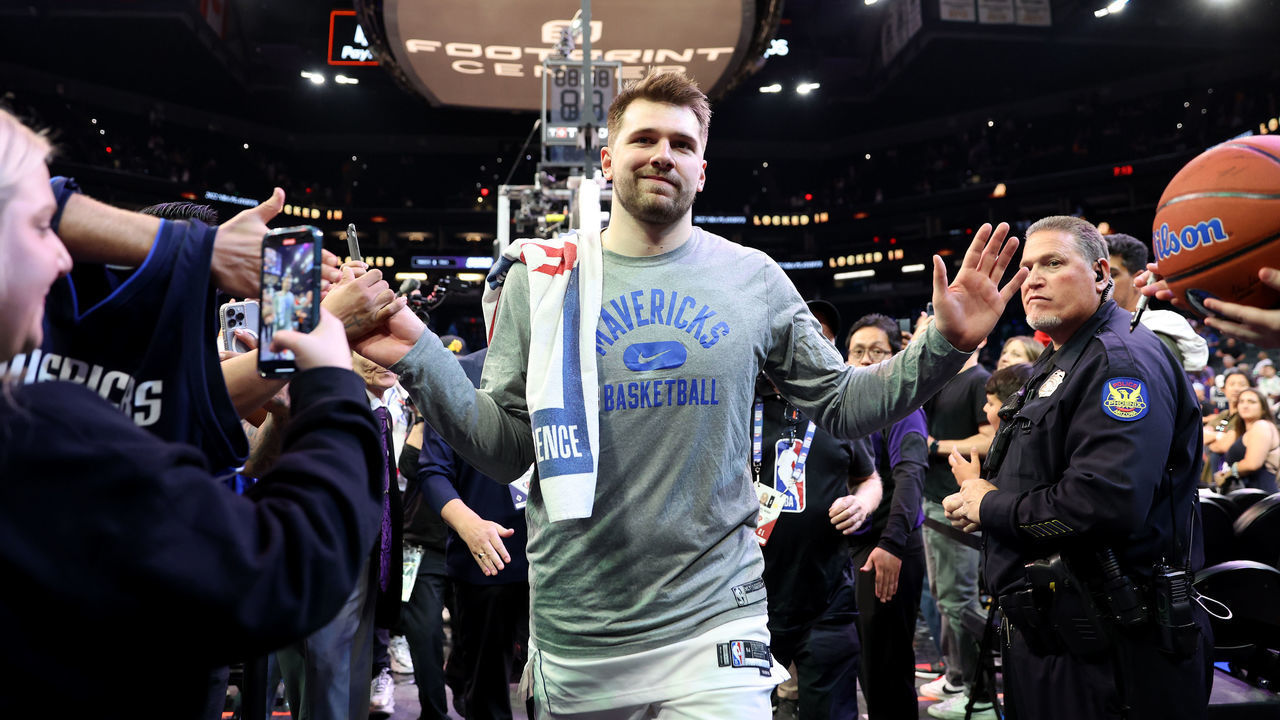 PHOENIX, ARIZONA - MAY 15: Luka Doncic #77 of the Dallas Mavericks leaves the court after defeating the Phoenix Suns 123-90 in Game Seven of the 2022 NBA Playoffs Western Conference Semifinals at Footprint Center on May 15, 2022 in Phoenix, Arizona. NOTE TO USER: User expressly acknowledges and agrees that, by downloading and/or using this photograph, User is consenting to the terms and conditions of the Getty Images License Agreement.
