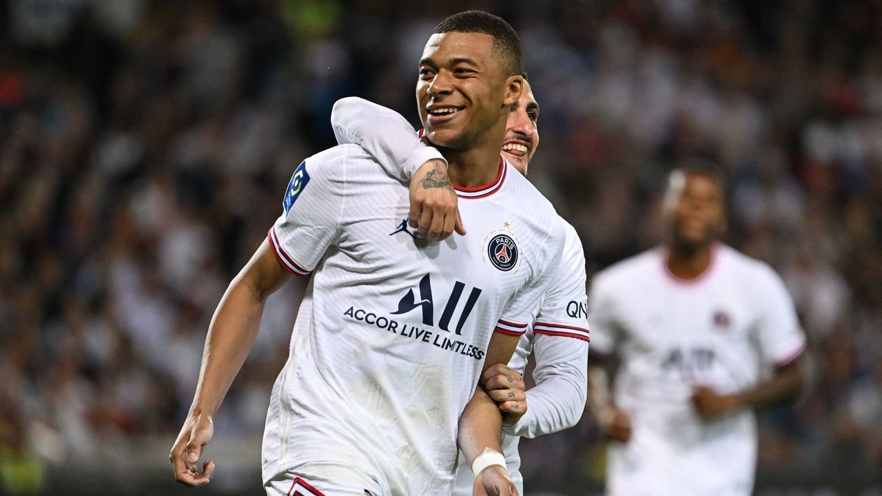 Paris Saint-Germain's French forward Kylian Mbappe reacts after scoring a penalty kick during the French L1 football match between Montpellier Herault SC and PSG at La Mosson stadium in Montpellier, southern France, on May 14, 2022.