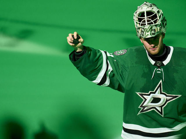 DALLAS, TX - MAY 13: Jake Oettinger #29 of the Dallas Stars celebrates after defeating the Calgary Flames in Game Six of the First Round of the 2022 Stanley Cup Playoffs at American Airlines Center on May 13, 2022 in Dallas, Texas.