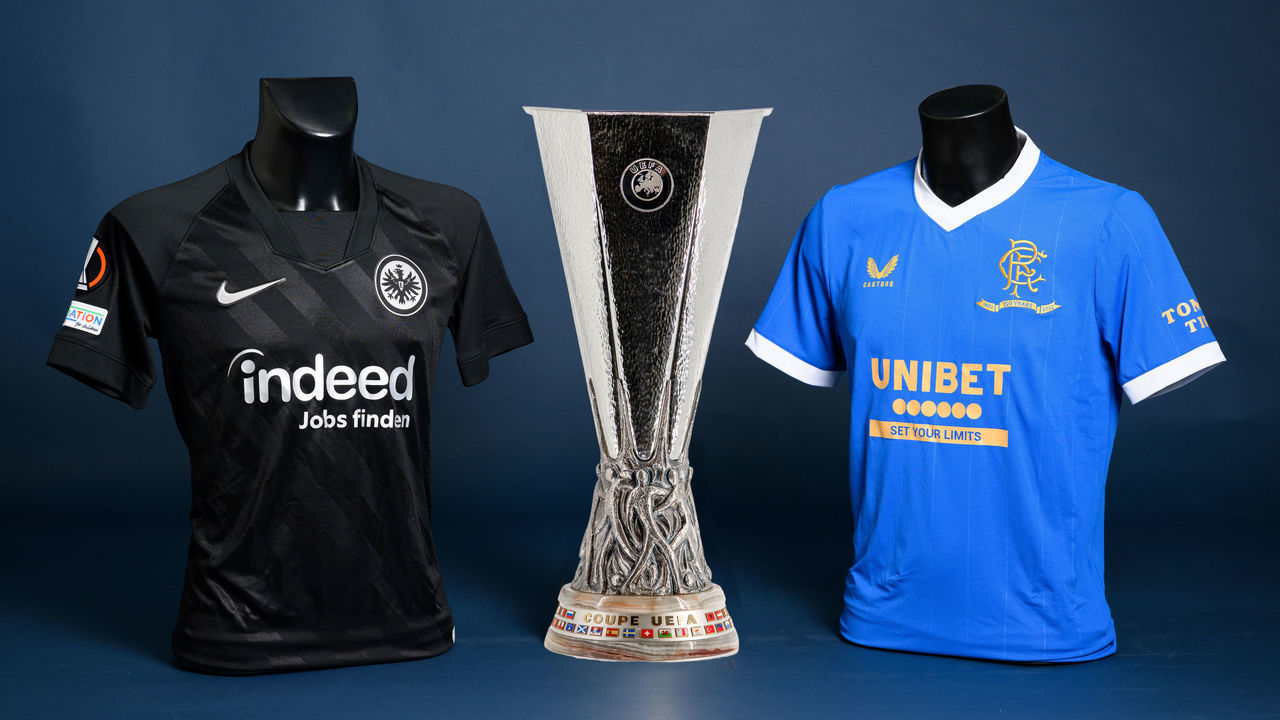 NYON, SWITZERLAND - MAY 6: A view of the Eintracht Frankfurt and Rangers FC jerseys with the UEFA Europa League trophy during the UEFA Europa League Final 2021/22 Jerseys Shoot at the UEFA Headquarters, The House of the European Football, on May 6, 2022, in Nyon, Switzerland.