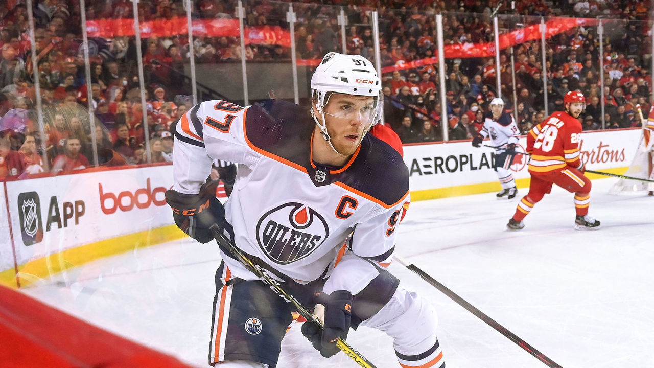 CALGARY, AB - MARCH 07: Edmonton Oilers Center Connor McDavid (97) skates with the puck during the first period of an NHL game where the Calgary Flames hosted the Edmonton Oilers on March 7, 2022, at the Scotiabank Saddledome in Calgary, AB.