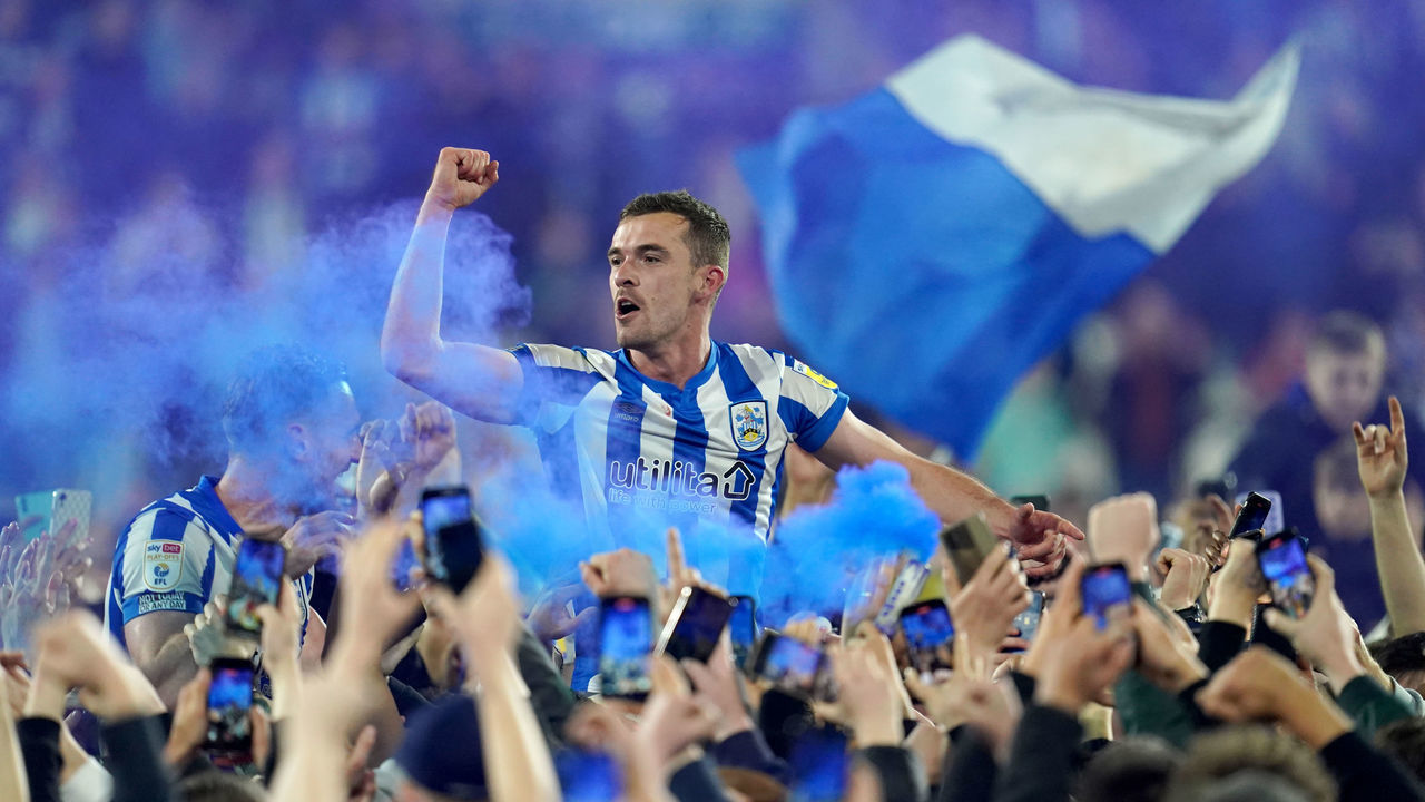 Huddersfield Town's Harry Toffolo celebrates getting through to the play off final at full time after the Sky Bet Championship play-off semi-final, second leg match at the John Smith's Stadium, Huddersfield. Picture date: Monday May 16, 2022.