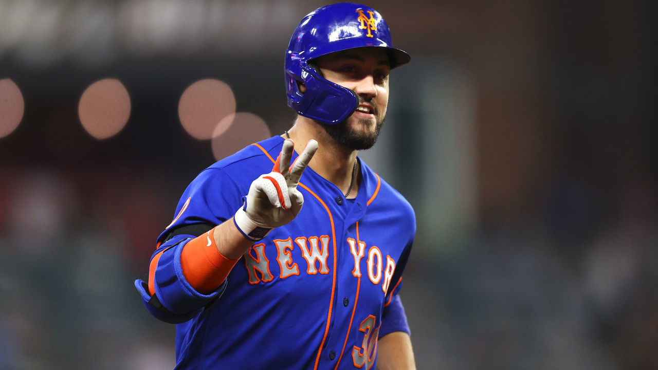 ATLANTA, GA - OCTOBER 02: Michael Conforto #30 of the New York Mets reacts after hitting a ball deep for a home run during the eighth inning of the game against the Atlanta Braves at Truist Park on October 2, 2021 in Atlanta, Georgia.