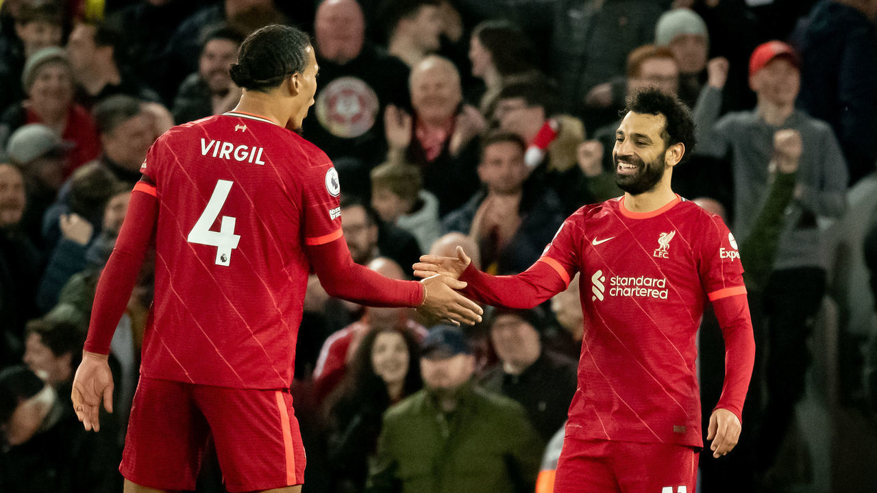 LIVERPOOL, ENGLAND - APRIL 19: Mohamed Salah of Liverpool celebrates scoring their fourth goal during the Premier League match between Liverpool and Manchester United at Anfield on April 19, 2022 in Liverpool, England.