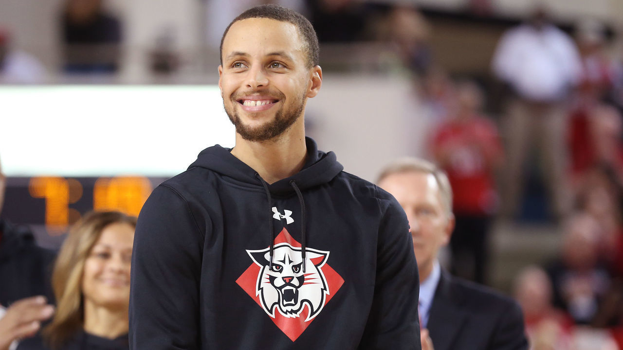 DAVIDSON, NC - JANUARY 24: Stephen Curry #30 of the Golden State Warriors smiles on the court during the ceremony to name the student section after him at Davidson's John M. Belk Area after him at Davidson College on January 24, 2017 in Davidson, North Carolina. Mandatory Copyright Notice: Copyright 2017 NBAE