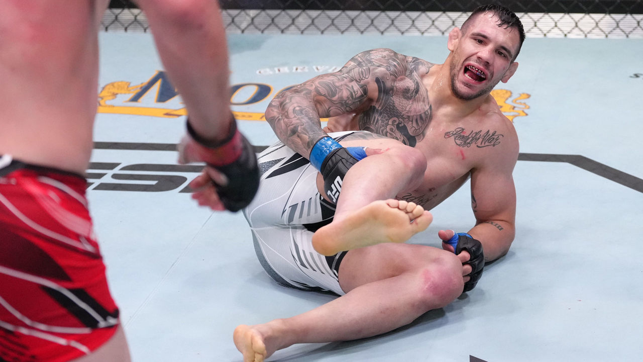 LAS VEGAS, NEVADA - MAY 14: Aleksandar Rakic of Austria reacts after suffering an apparent knee injury against Jan Blachowicz of Poland in a light heavyweight fight during the UFC Fight Night event at UFC APEX on May 14, 2022 in Las Vegas, Nevada.