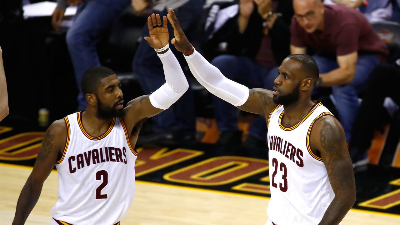 CLEVELAND, OH - JUNE 09: Kyrie Irving #2 and LeBron James #23 of the Cleveland Cavaliers celebrate after a play in the first quarter against the Golden State Warriors in Game 4 of the 2017 NBA Finals at Quicken Loans Arena on June 9, 2017 in Cleveland, Ohio.