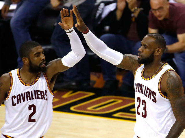 CLEVELAND, OH - JUNE 09: Kyrie Irving #2 and LeBron James #23 of the Cleveland Cavaliers celebrate after a play in the first quarter against the Golden State Warriors in Game 4 of the 2017 NBA Finals at Quicken Loans Arena on June 9, 2017 in Cleveland, Ohio.