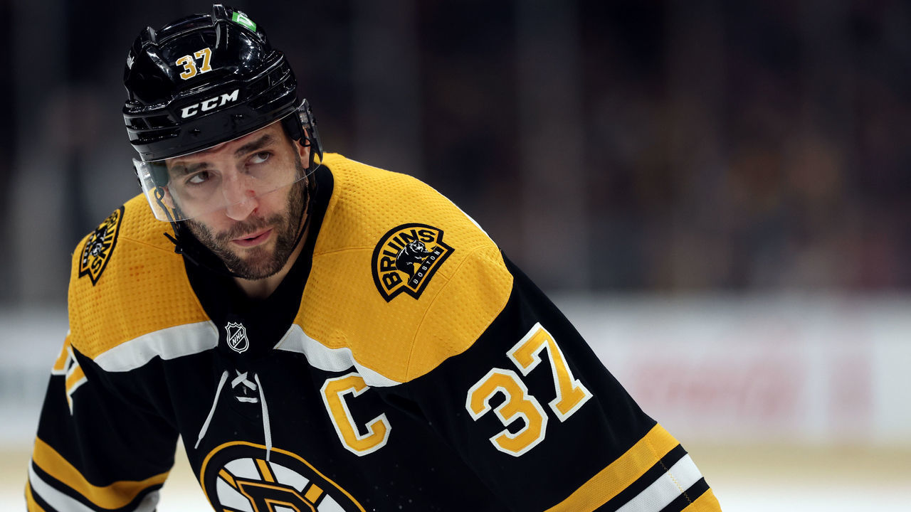 BOSTON, MASSACHUSETTS - APRIL 14: Patrice Bergeron #37 of the Boston Bruins looks on during the first period against the Ottawa Senators at TD Garden on April 14, 2022 in Boston, Massachusetts.