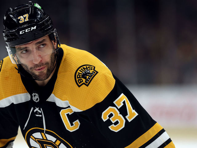 BOSTON, MASSACHUSETTS - APRIL 14: Patrice Bergeron #37 of the Boston Bruins looks on during the first period against the Ottawa Senators at TD Garden on April 14, 2022 in Boston, Massachusetts.