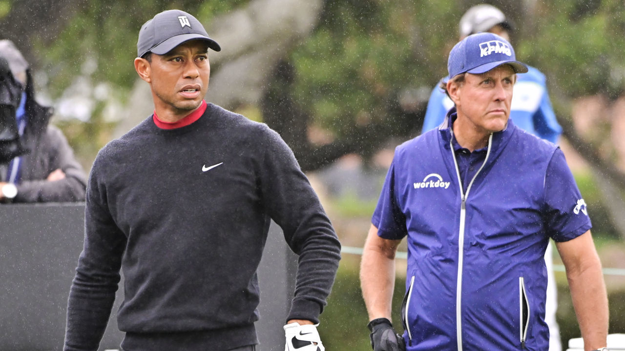 THOUSAND OAKS, CA - OCTOBER 25: Tiger Woods watches his tee shot on the 10th hole while Phil Mickelson gets ready to hit during the final round of the ZOZO Championship at Sherwood Country Club on October 25, 2020 in Thousand Oaks, California.