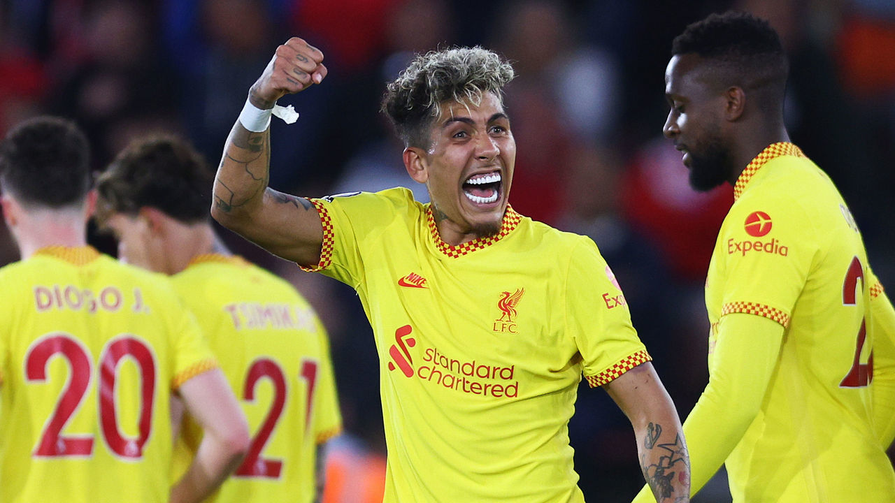 SOUTHAMPTON, ENGLAND - MAY 17: Roberto Firmino of Liverpool celebrates after Joel Matip (not pictured) scores their sides second goal during the Premier League match between Southampton and Liverpool at St Mary's Stadium on May 17, 2022 in Southampton, England.
