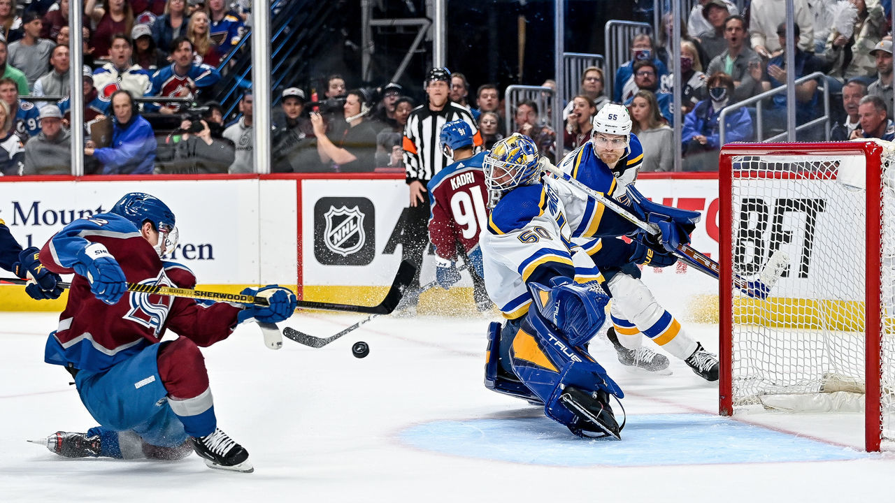 DENVER, CO - MAY 17: St. Louis Blues goaltender Jordan Binnington (50) makes a save against a point blank shot by Colorado Avalanche left wing Gabriel Landeskog (92) during a Stanley Cup Playoffs round 2 game between the St. Louis Blues and the Colorado Avalanche at Ball Arena in Denver, Colorado on May 17, 2022.