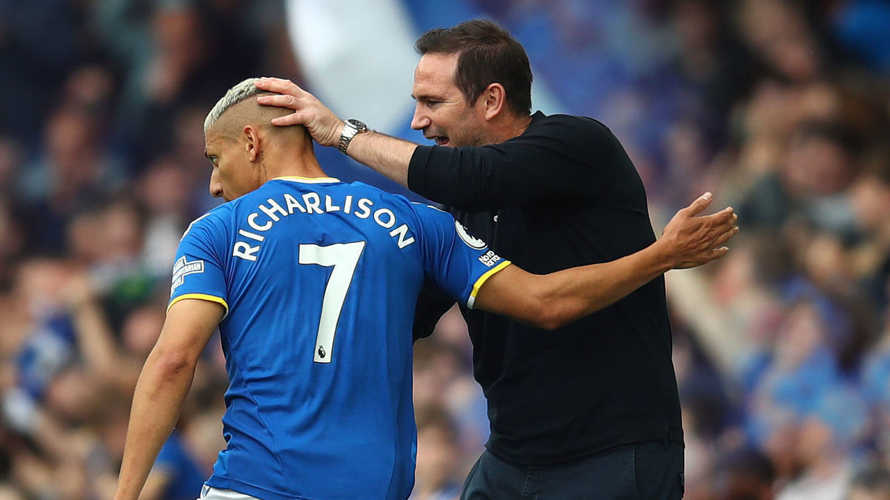 LIVERPOOL, ENGLAND - MAY 15: Richarlison of Everton celebrates scoring the opening goal with manager Frank Lampard during the Premier League match between Everton and Brentford at Goodison Park on May 15, 2022 in Liverpool, England.