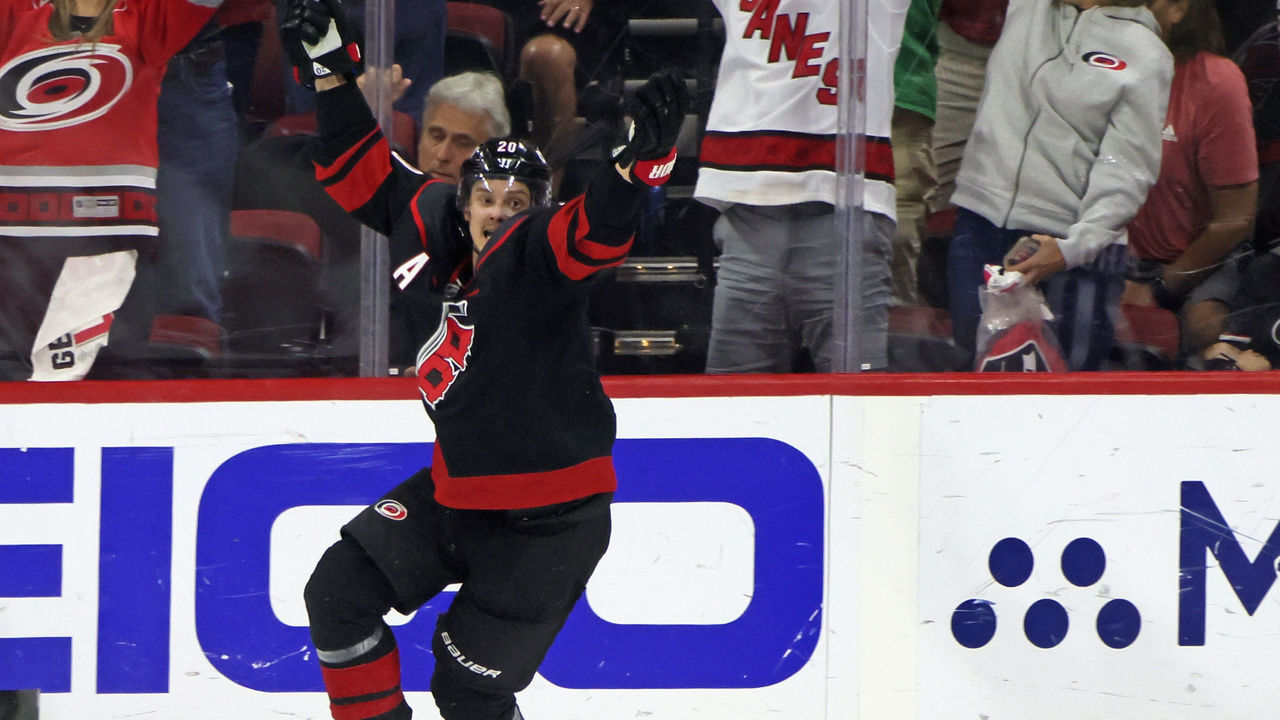 RALEIGH, NORTH CAROLINA - MAY 18: Sebastian Aho #20 of the Carolina Hurricanes celebrates his goal against the New York Rangers at 17:37 of the third period in Game One of the Second Round of the 2022 Stanley Cup Playoffs at PNC Arena on May 18, 2022 in Raleigh, North Carolina.