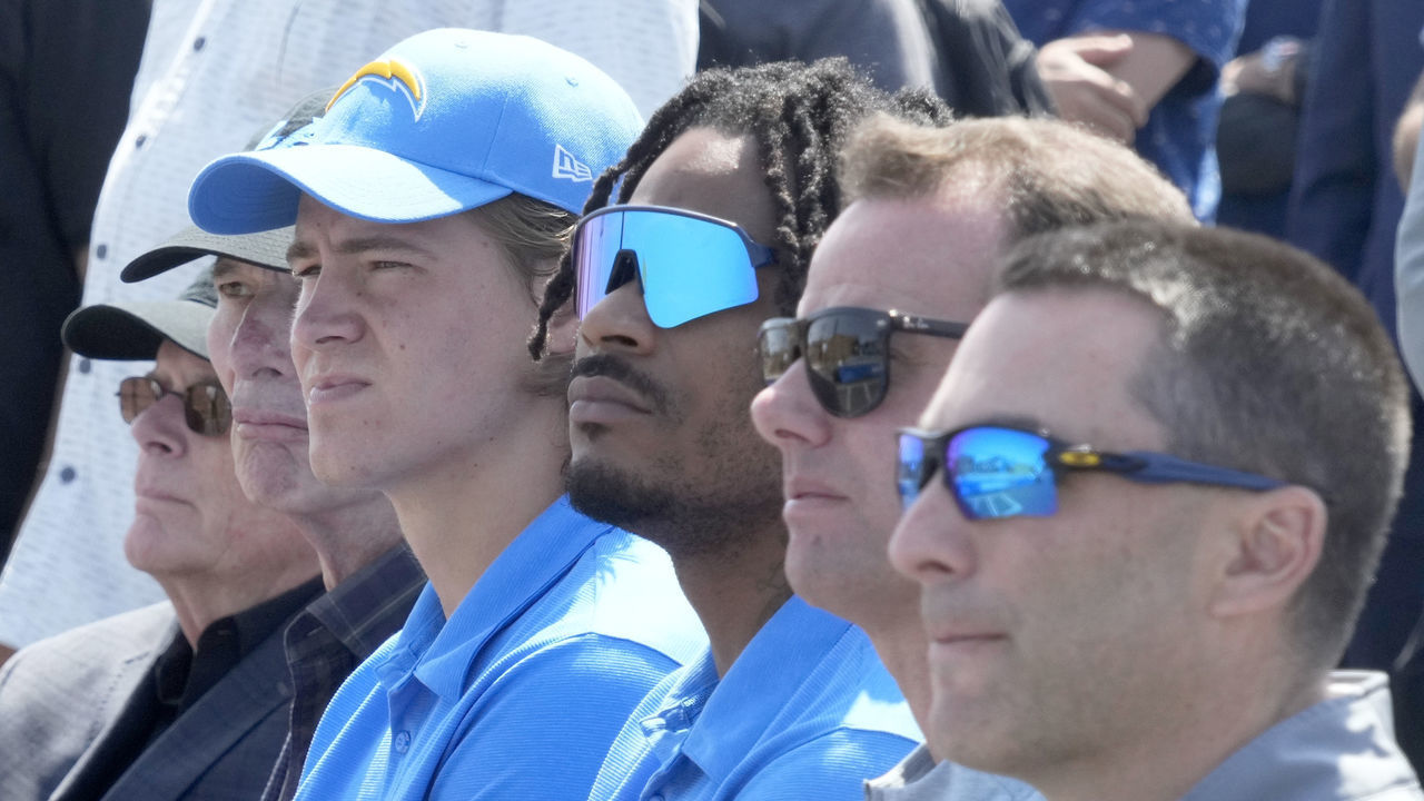 El Segundo, CA - May 18: Los Angeles Chargers quarterback Justin Herbert, left, along with Derwin James, center, and head coach Brandon Staley, second from right, during a ground breaking for the future corporate headquarters and training facility of the Los Angeles Chargers in El Segundo on Wednesday, May 18, 2022.