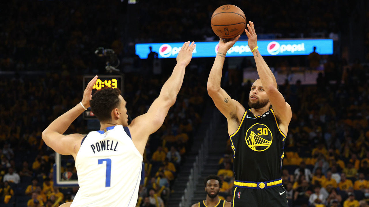 SAN FRANCISCO, CALIFORNIA - MAY 18: Stephen Curry #30 of the Golden State Warriors shoots a three point basket against Dwight Powell #7 of the Dallas Mavericks during the third quarter in Game One of the 2022 NBA Playoffs Western Conference Finals at Chase Center on May 18, 2022 in San Francisco, California.