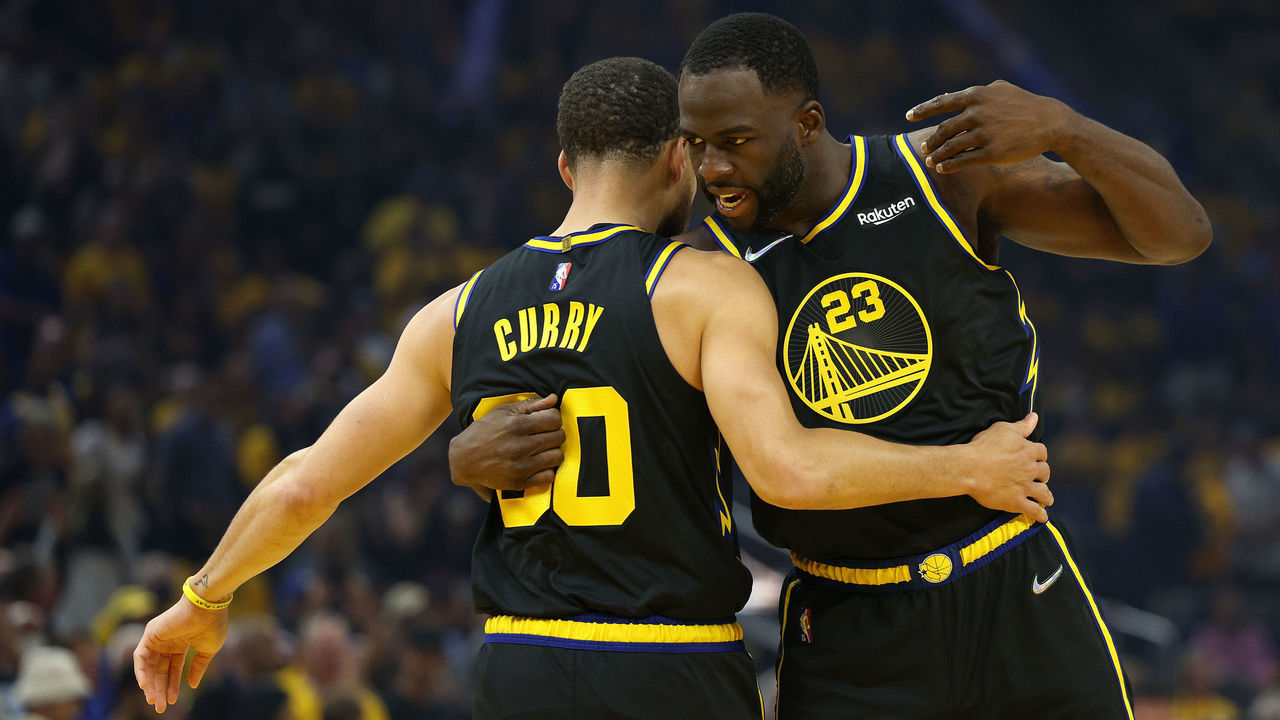 SAN FRANCISCO, CALIFORNIA - MAY 18: Draymond Green #23 of the Golden State Warriors hugs teammate Stephen Curry #30 prior to Game One against the Dallas Mavericks in the 2022 NBA Playoffs Western Conference Finals at Chase Center on May 18, 2022 in San Francisco, California.