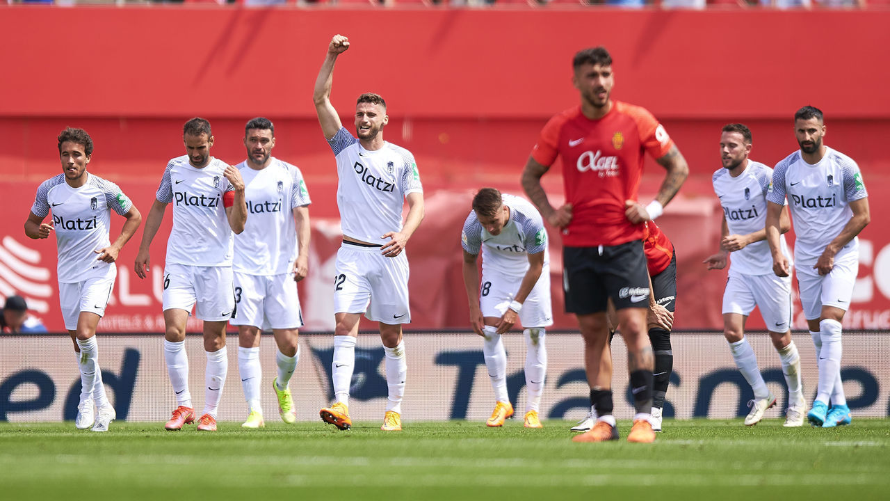 MALLORCA, SPAIN - MAY 07: Players of Granada CF celebrate after Jorge Molina scored his team sixth goal during the La Liga Santader match between RCD Mallorca and Granada CF at Estadio de Son Moix on May 07, 2022 in Mallorca, Spain.