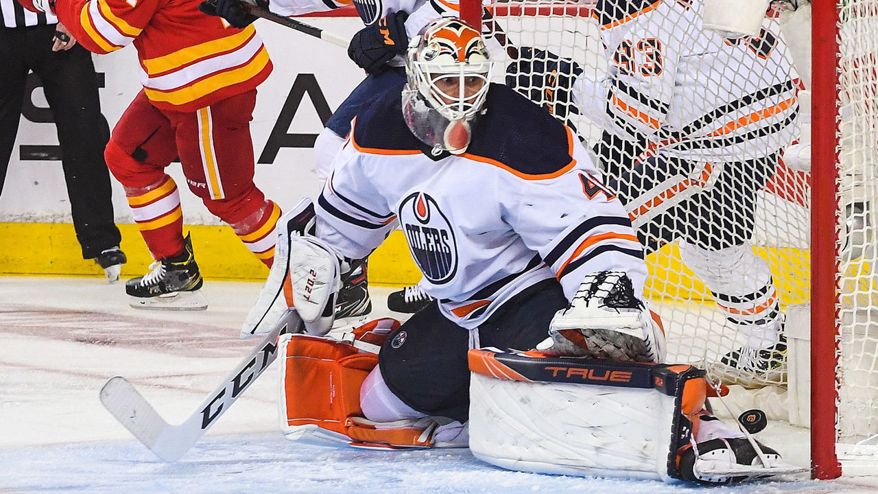 CALGARY, AB - MAY 18: Andrew Mangiapane #88 (not pictured) of the Calgary Flames scores on Mike Smith #41 of the Edmonton Oilers during the first period of Game One of the Second Round of the 2022 Stanley Cup Playoffs at Scotiabank Saddledome on May 18, 2022 in Calgary, Alberta, Canada.