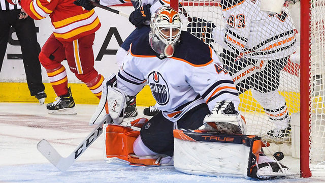 CALGARY, AB - MAY 18: Andrew Mangiapane #88 (not pictured) of the Calgary Flames scores on Mike Smith #41 of the Edmonton Oilers during the first period of Game One of the Second Round of the 2022 Stanley Cup Playoffs at Scotiabank Saddledome on May 18, 2022 in Calgary, Alberta, Canada.