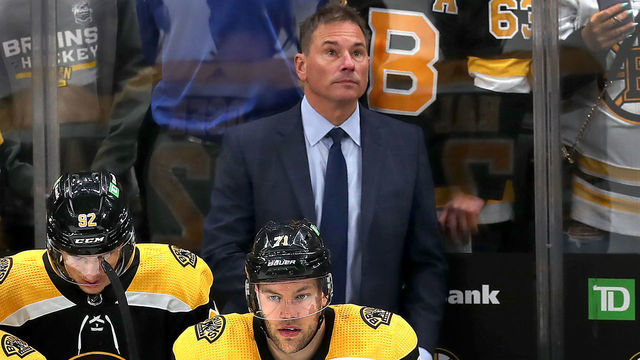 Boston - May 8: Coach Bruce Cassidy appears content with seconds left in the game. The Boston Bruins host the Carolina Hurricanes in an NHL game at TD Garden in Boston on May 8, 2022.