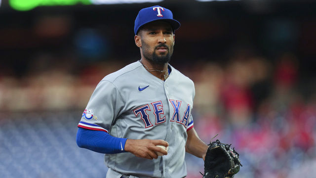 PHILADELPHIA, PA - MAY 03: Marcus Semien #2 of the Texas Rangers looks on against the Philadelphia Phillies at Citizens Bank Park on May 3, 2022 in Philadelphia, Pennsylvania. The Rangers defeated the Phillies 6-4.