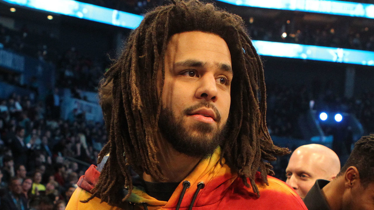 CHARLOTTE, NC - FEBRUARY 17: Rapper, J. Cole, looks on during the 2019 NBA All-Star Game on February 17, 2019 at the Spectrum Center in Charlotte, North Carolina. NOTE TO USER: User expressly acknowledges and agrees that, by downloading and/or using this photograph, user is consenting to the terms and conditions of the Getty Images License Agreement. Mandatory Copyright Notice: Copyright 2019 NBAE