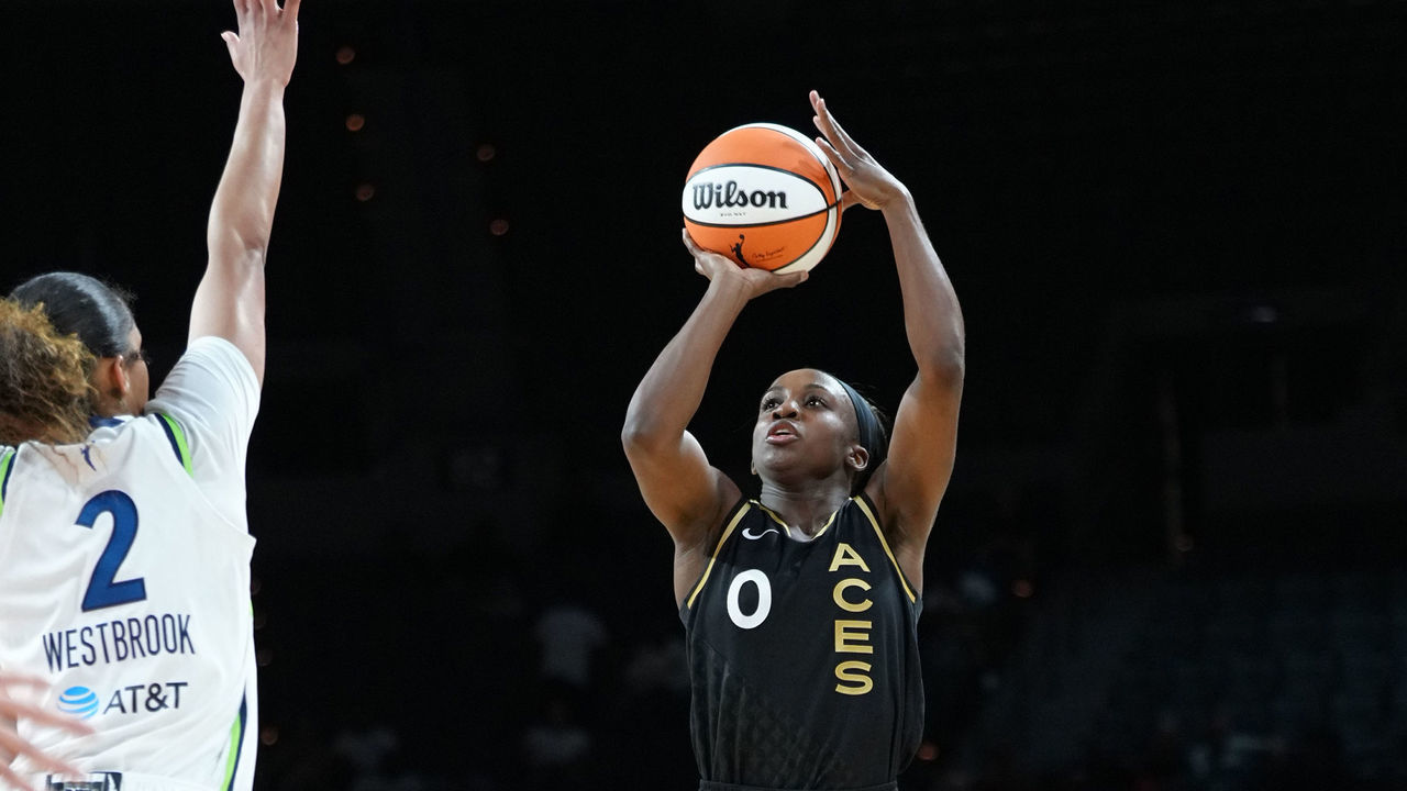LAS VEGAS, NV - MAY 19: Jackie Young #0 of the Las Vegas Aces shoots the ball during the game Minnesota Lynx on May 19, 2022 at Michelob Ultra Arena in Las Vegas, California. NOTE TO USER: User expressly acknowledges and agrees that, by downloading and/or using this Photograph, user is consenting to the terms and conditions of the Getty Images License Agreement. Mandatory Copyright Notice: Copyright 2022 NBAE