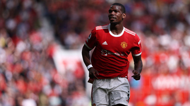 MANCHESTER, ENGLAND - APRIL 16: Paul Pogba of Manchester United in action during the Premier League match between Manchester United and Norwich City at Old Trafford on April 16, 2022 in Manchester, England.