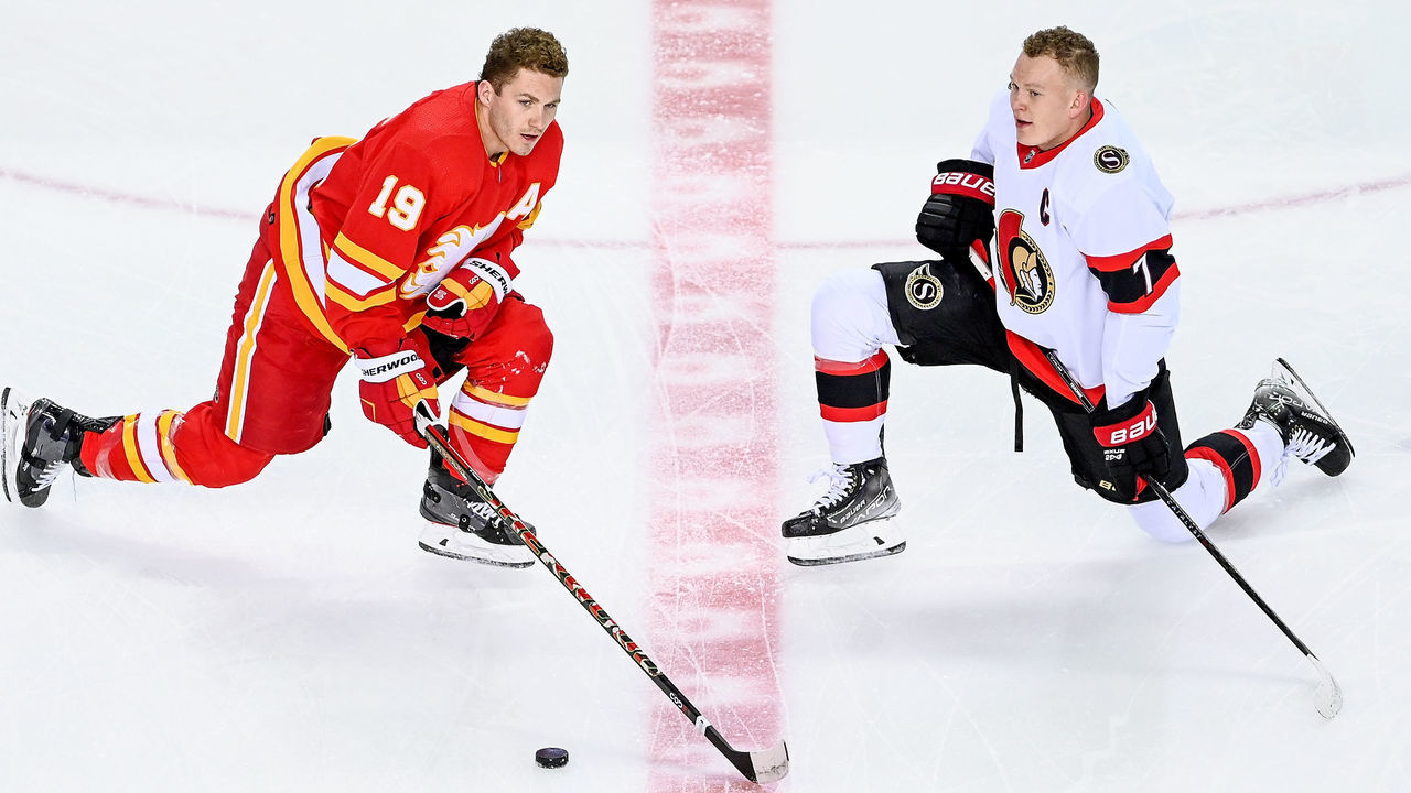 CALGARY, AB - JANUARY 13: Brothers Calgary Flames Right Wing Matthew Tkachuk (19) and Ottawa Senators Left Wing Brady Tkachuk (7) warm up before an NHL game where the Calgary Flames hosted the Ottawa Senators on January 13, 2022, at the Scotiabank Saddledome in Calgary, AB.