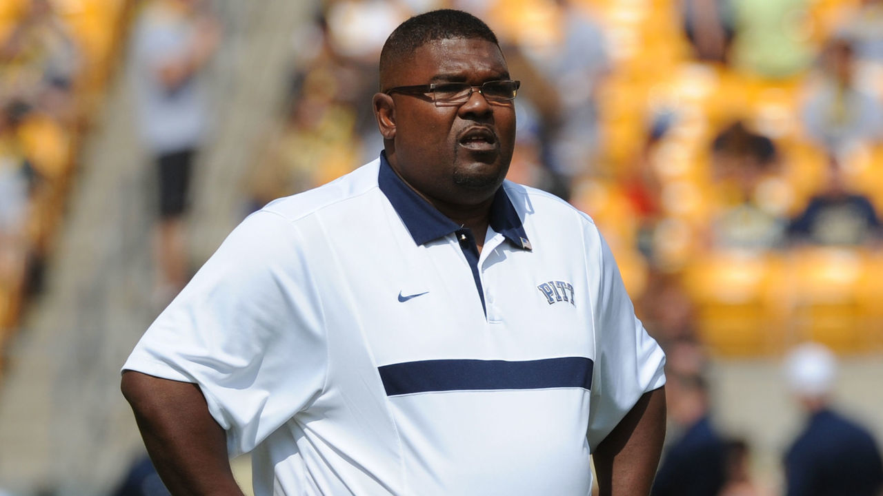 PITTSBURGH - SEPTEMBER 10: Assistant head coach Calvin Magee of the University of Pittsburgh Panthers looks on from the field before a college football game against the Maine Black Bears at Heinz Field on September 10, 2011 in Pittsburgh, Pennsylvania. The Pitt Panthers defeated the Black Bears 35-29.