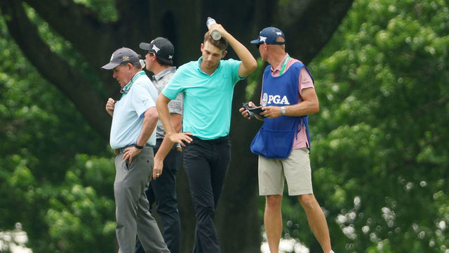 TULSA, OKLAHOMA - MAY 20: Aaron Wise of the United States stands on the seventh hole after being hit by a ball hit by Cameron Smith of Australia during the second round of the 2022 PGA Championship at Southern Hills Country Club on May 20, 2022 in Tulsa, Oklahoma.