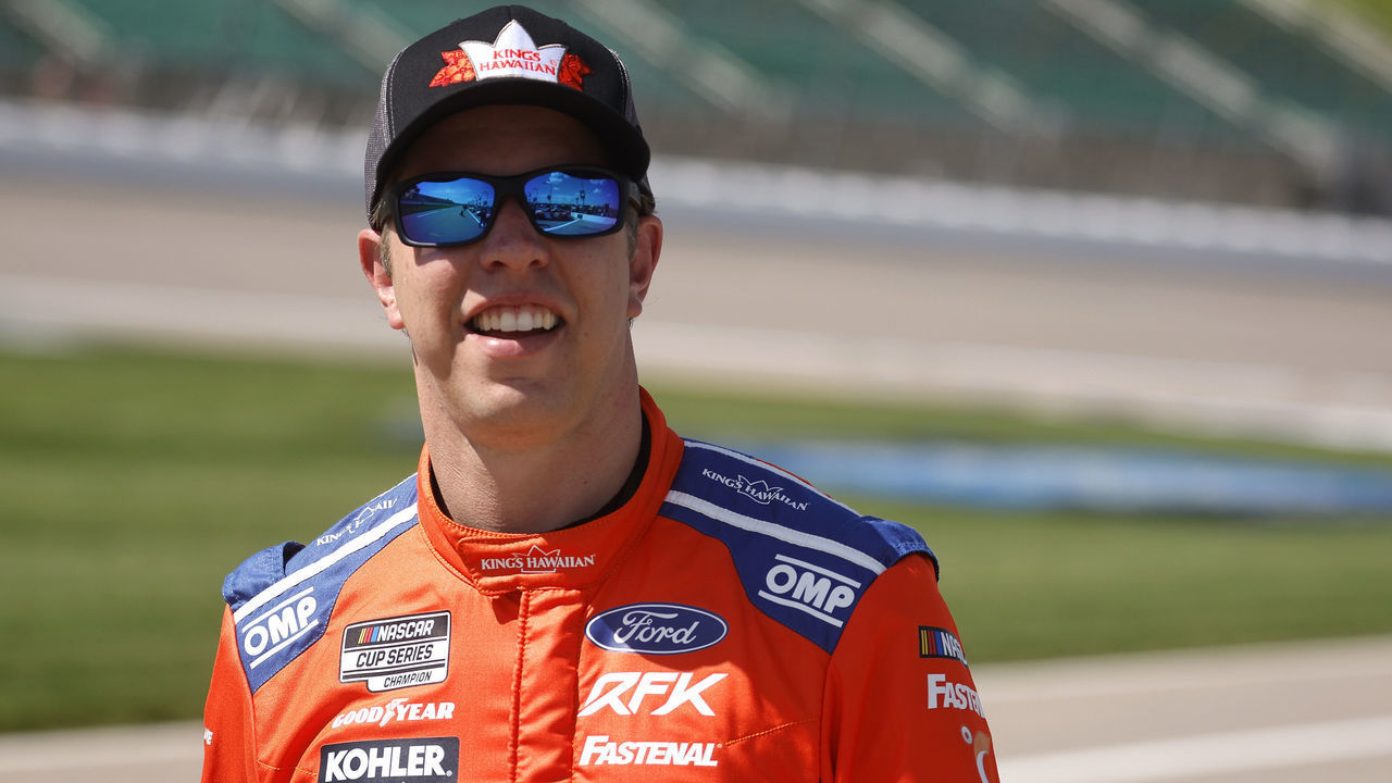 KANSAS CITY, KANSAS - MAY 14: Brad Keselowski, driver of the #6 King's Hawaiian Ford, walks the grid during practice for the NASCAR Cup Series AdventHealth 400 at Kansas Speedway on May 14, 2022 in Kansas City, Kansas.