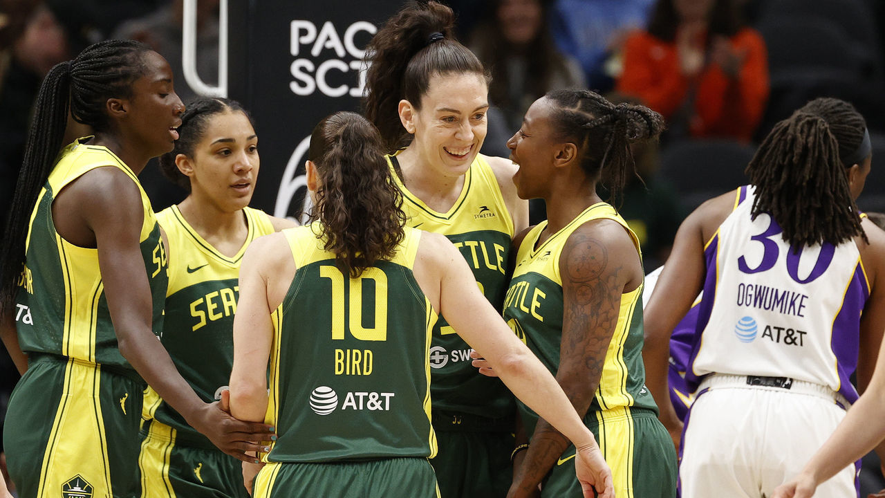 SEATTLE, WASHINGTON - MAY 20: Breanna Stewart #30 and Jewell Loyd #24 of the Seattle Storm react after a basket against the Los Angeles Sparks during the first half at Climate Pledge Arena on May 20, 2022 in Seattle, Washington.