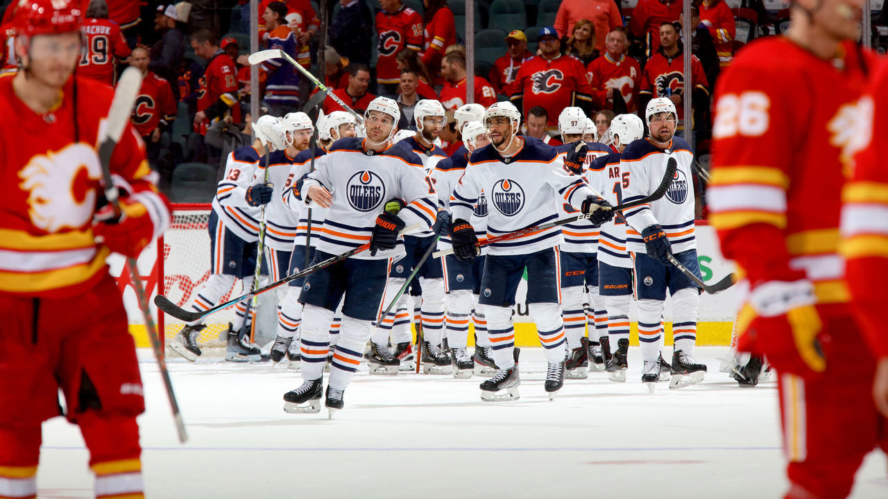 CALGARY, ALBERTA - MAY 20: Teammates of the Edmonton Oilers celebrate a win against the Calgary Flames in Game Two of the Second Round of the 2022 Stanley Cup Playoffs at Scotiabank Saddledome on May 20, 2022 in Calgary, Alberta.