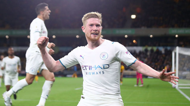 WOLVERHAMPTON, ENGLAND - MAY 11: Kevin De Bruyne of Manchester City celebrates scoring his side's fourth goal during the Premier League match between Wolverhampton Wanderers and Manchester City at Molineux on May 11, 2022 in Wolverhampton, England.