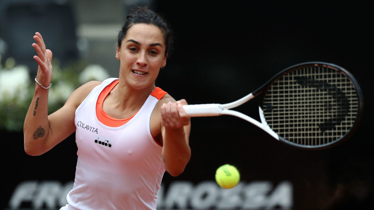 ROME, ITALY - MAY 09: Martina Trevisan of Italy returns a forehand against Zhang Shuai of China during their singles first round match in the Internazionali BNL D'Italia at Foro Italico on May 09, 2022 in Rome, Italy.