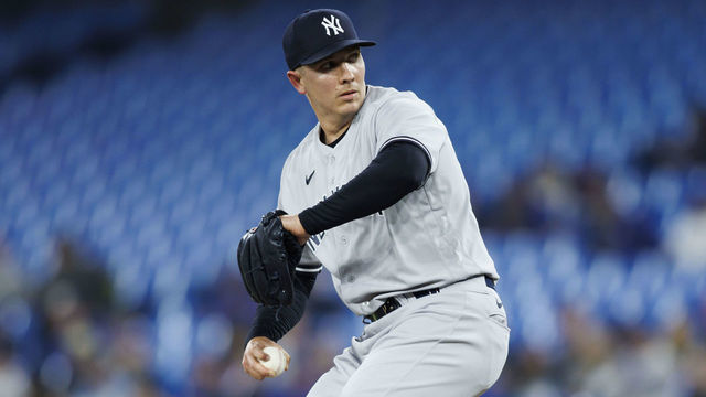 TORONTO, ON - MAY 02: Chad Green #57 of the New York Yankees pitches in the ninth inning of their MLB game against the Toronto Blue Jays at Rogers Centre on May 2, 2022 in Toronto, Canada.