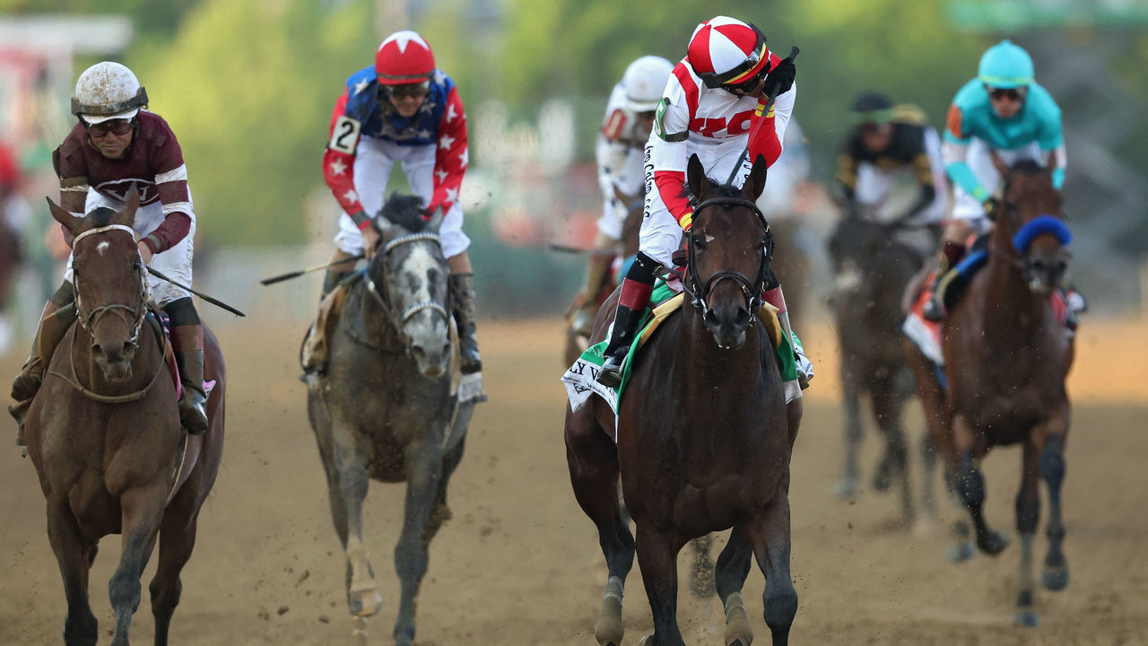 BALTIMORE, MARYLAND - MAY 21: Jockey Jose Ortiz #5 riding Early Voting celebrates after winning the 147th Running of the Preakness Stakes at Pimlico Race Course on May 21, 2022 in Baltimore, Maryland.
