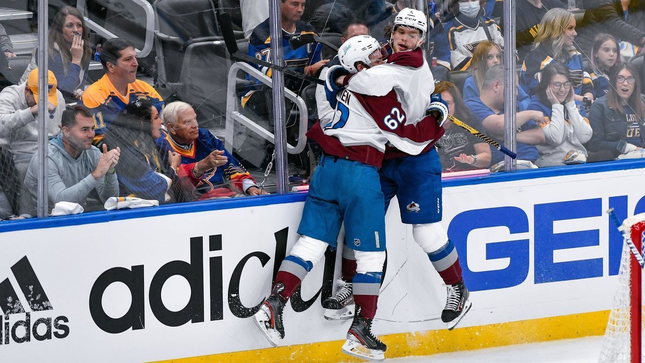 ST. LOUIS, MO - MAY 21: Colorado Avalanche left wing Artturi Lehkonen (62) jumps into the arms of Colorado Avalanche defenseman Bowen Byram (4) celebrating his goal during Round 2 game 3 of the Stanley Cup Playoffs between the Colorado Avalanche and the St. Louis Blues on May 21, 2022, at the Enterprise Center in St. Louis MO