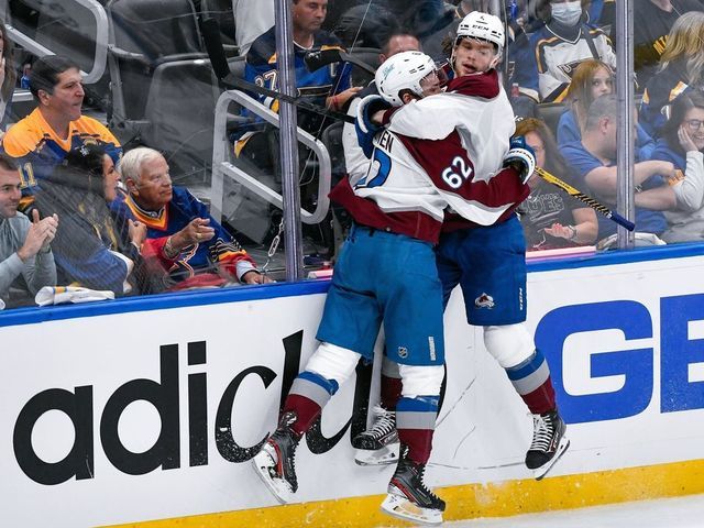 ST. LOUIS, MO - MAY 21: Colorado Avalanche left wing Artturi Lehkonen (62) jumps into the arms of Colorado Avalanche defenseman Bowen Byram (4) celebrating his goal during Round 2 game 3 of the Stanley Cup Playoffs between the Colorado Avalanche and the St. Louis Blues on May 21, 2022, at the Enterprise Center in St. Louis MO