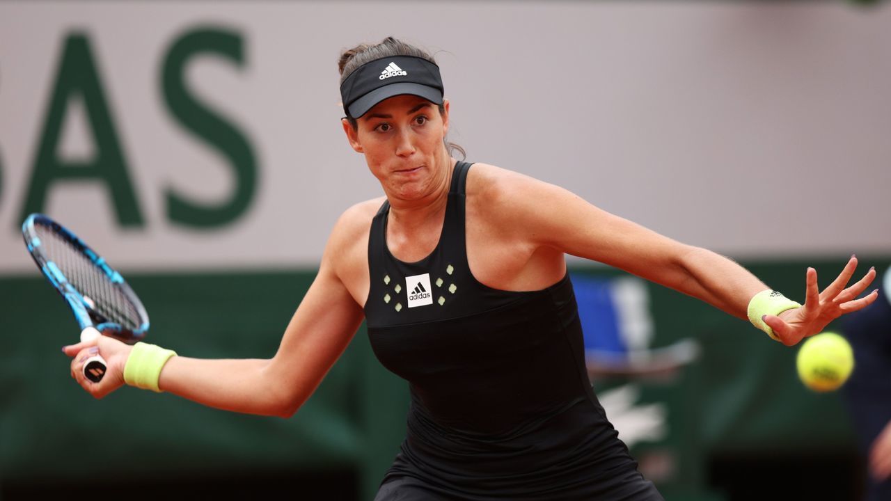 PARIS, FRANCE - MAY 22: Garbine Muguruza of Spain plays a forehand during her womens singles first round against Kaia Kanepi of Estonia on day 1 of the 2022 French Open at Roland Garros on May 22, 2022 in Paris, France.